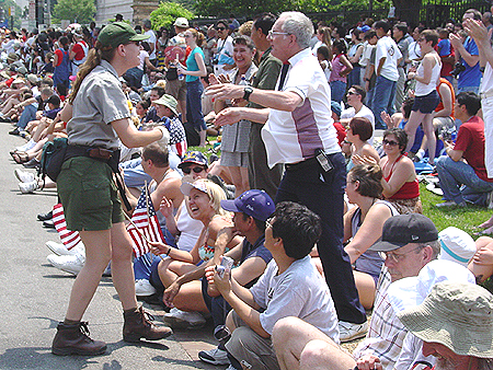 The woman on the left, in the green uniform, is park police