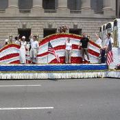 People from the USA float wave to the crowd