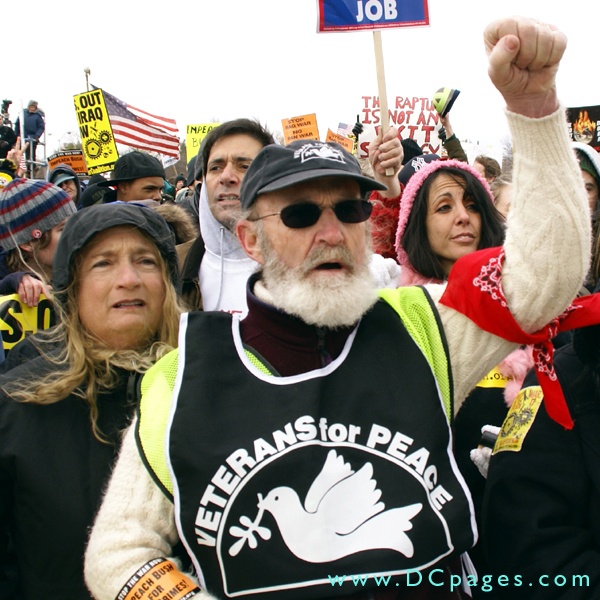 Man with VETERANS for PEACE shirt on.