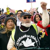 Man with VETERANS for PEACE shirt on.