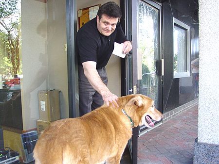 Licensed optician, Kenneth Kramer, gives Wiley an eye exam. Wiley needs glasses.

