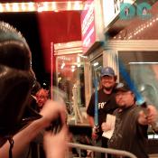 Darth Vader confronts two Jedis in front of Uptown Theater.