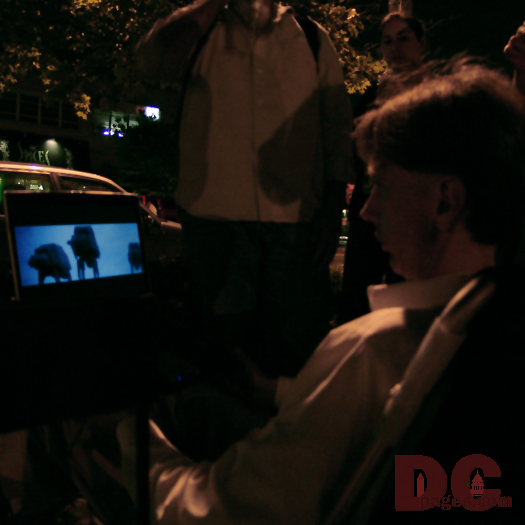 This fan watched 'Empire Strikes Back' on his DVD player while he waited the Star Wars Premiere.