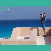 viewing cancun through binoculars