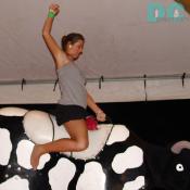 girl riding mechanical bull