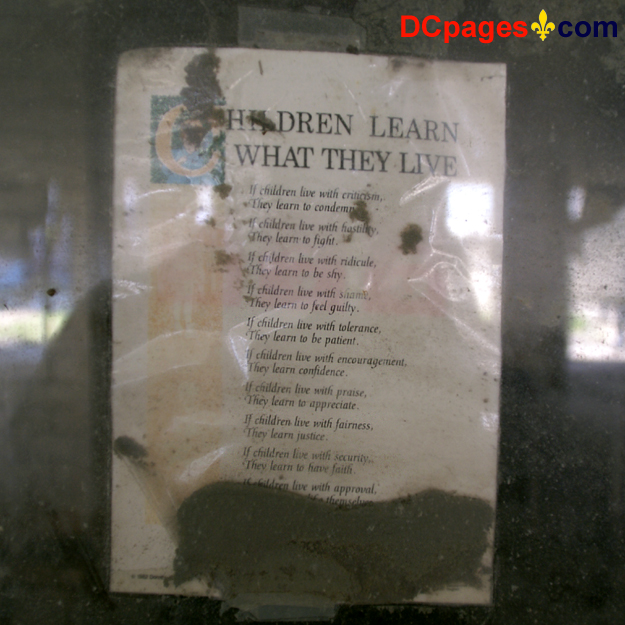 August 2, 2007 - Ninth Ward of New Orleans - 5300 Law Sreet, New Orleans, 70117, LA 504-942-3602 - Alfred Lawless High School - Taped up poem titled "Children Learn What They Live."