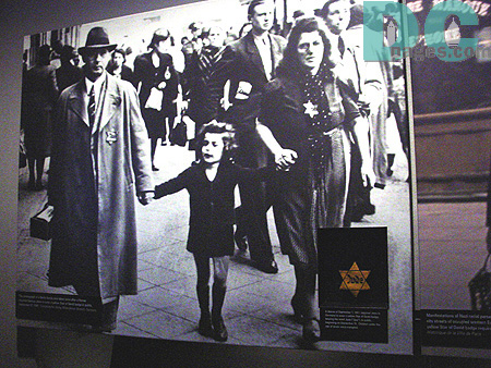 Shows how the Jewish were required to wear these yellow stars to show everyone that they were Jewish.