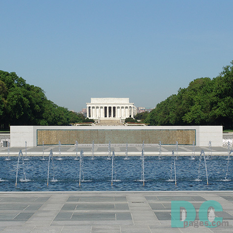West to East View of the World War II Memorial. 4,000 sculpted gold stars on the Freedom Wall. Lincoln Memorial in the background.