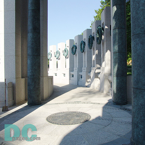 Inlayed on the floor of the arches is the WWII victory medal surrounded by the years "1941-1945" and the words "Victory on Land," "Victory at Sea," and "Victory in the Air." These sculptural elements celebrate the victory won in the Atlantic and Pacific Theaters.