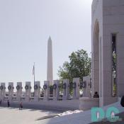 East to West view of granite pillars celebrating the unprecedented unity of the nation during WWII. Special thanks to Bob Hovas, WWII veteran and the second public visitor to the Memorial for pointing out this shot. "When you see the flag furling in the wind moving around the names of all the parts of our country embodied in one place, gives one a great feeling of unity."