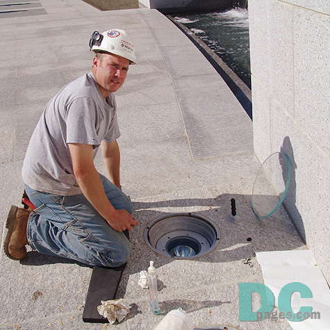 Paul cleans the fixtures. 