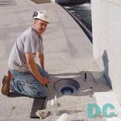 Paul cleans the fixtures. 