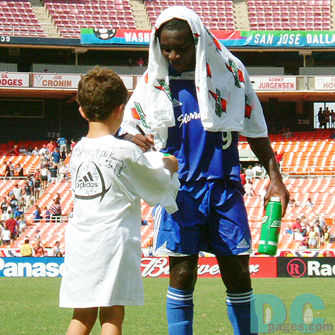 "Thank you for comming today" Freddy was signing on a T-shirt for his a little kid fan. 