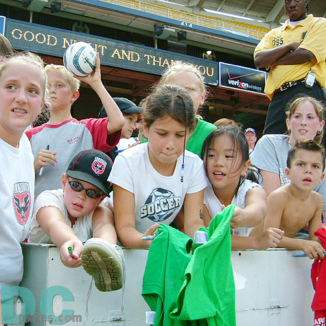 "Can you sign on my shoe?" "Can you sign on my shirt, Freddy?" Kids were waiting for their hero, Freddy Adu.