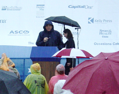 A speaker shares a personal story with the crowd