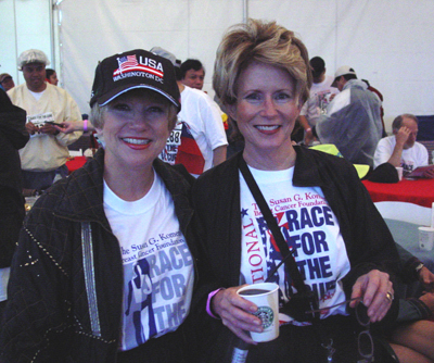 Staying dry, these two friends enjoyed the race