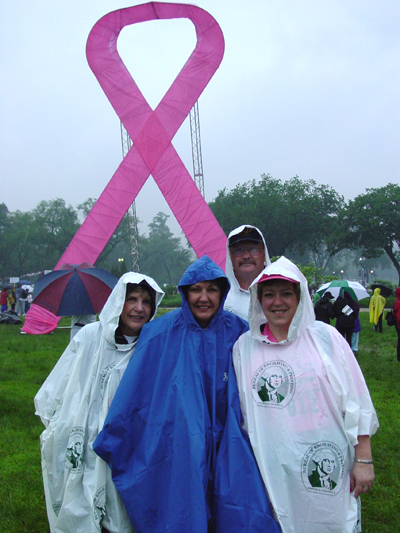 Standing infront of a powerful symbol, this family was proud to take part