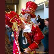 This guy competed in the Mummers Day Parade, but notice Local clubs (usually called "New Years Associations") compete in one of four categories (Comics, Fancies, String Bands and Fancy Brigades). 