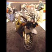 2004 Interceptor ABS has a 781cc liquid-cooled 90-degree V-4, single arm swing arm, side mounted radiators, and a really cool paint job called Asphalt Black.