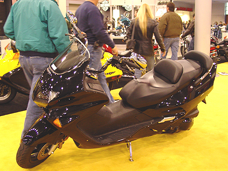 2004 Silver Wing ABS. Powerful. Sophisticated. Luxurious. Is it a scooter... or a motorcycle? Maybe a hybrid between the two. 