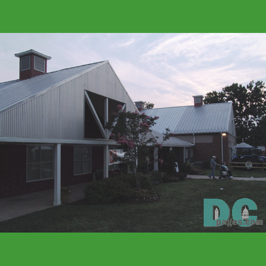 Sun setting on one of the permanent barn structures at the Montgomery County Fairgrounds.