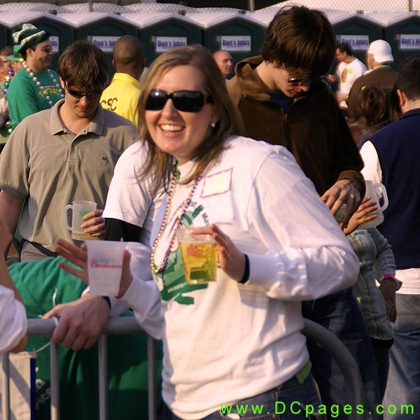 Smiling girl wearing the dark glasses.