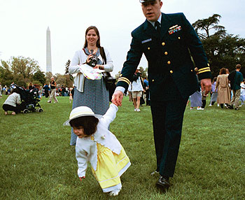 A tiny Easter egg toddler leads the charge.