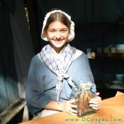 This girl sells sweet sweet rock candy, which was a treat at the time when having sugar was a luxury.