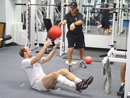 This may look easy, but the ball actually weights ten pounds.
