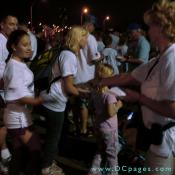"Freedom Walkers" are greeted by event volunteers and given a program schedule.