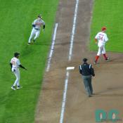 Another hit by the Baltimore Orioles. Washington Nationals Nick Johnson can only look on in frustration.