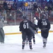 Libby and Mink skate up to the face off.
