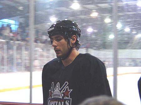 Caps enforcer, Alex Henry, heads to the locker room after one half of the scrimmage is over.