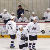 The players take a break after the fight.