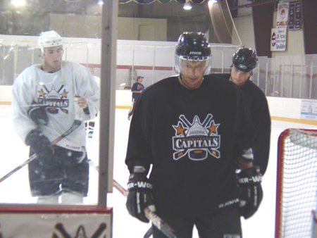 Bondra, Brian Sutherby, and Brendan Witt skate off after the period.