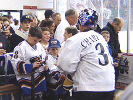 Goalie Sebastien Charpentier takes the time to meet and greet the fans.