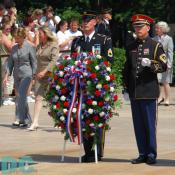 The ceremonial wreath is brought to the President.