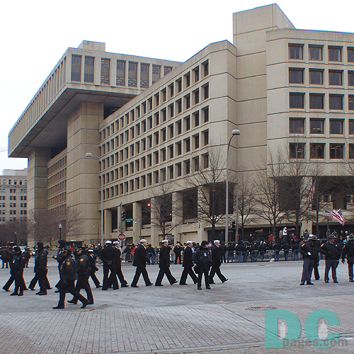 Soldiers walking in front the Hoover Building