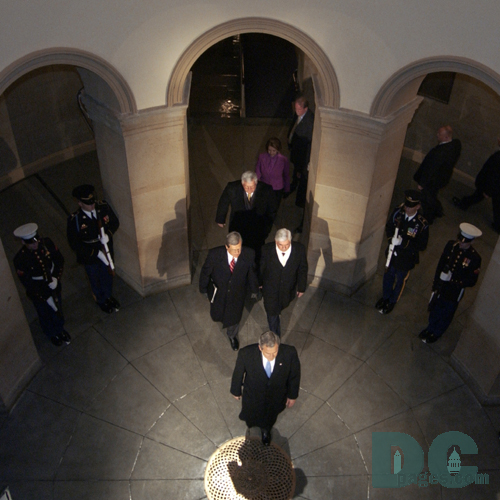 President George W. Bush walks past the Joint Honor Cordons inside the Capitol Building en route to the stage for the Swearing-In ceremony at the 55th Presidential Inauguration.