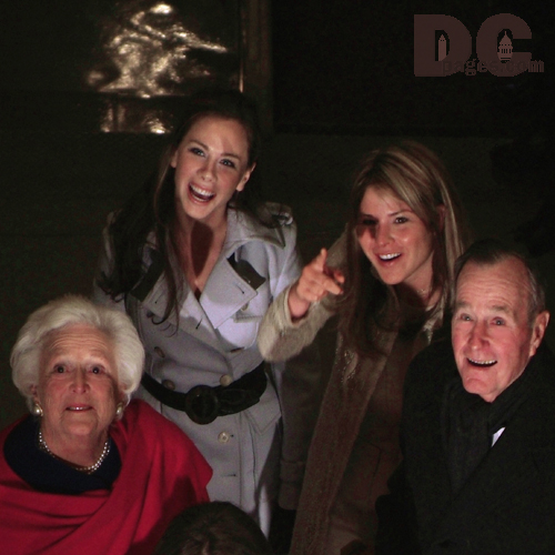 Former President George H.W. Bush and his wife Barbra Bush share a candid moment with their grandchildren, Jenna and Barbra, as they walk through the Capitol building onto the stage where they will witness son and father respectively, George W. Bush being sworn-in for his second term as President of the United States.