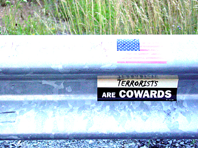 Terrorists are cowards bumper sticker.