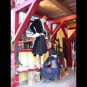 Catskill Mountian boot shop. This lady is fitting him for a pair of handmade boots.