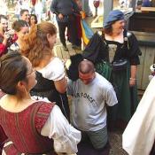 This man is preparing to get kissy tortured by the wenches