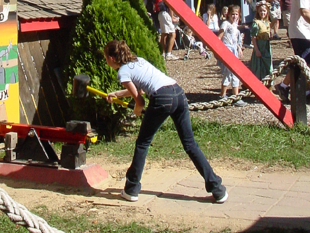 It will take a good swing of the mallot to bang the ball all the way up to ring that bell