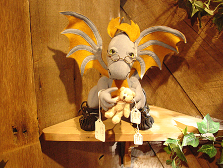  How much is that dragon in the window? 