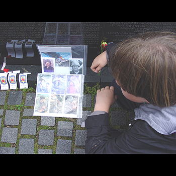 A boy leaving a photo package of his one relative