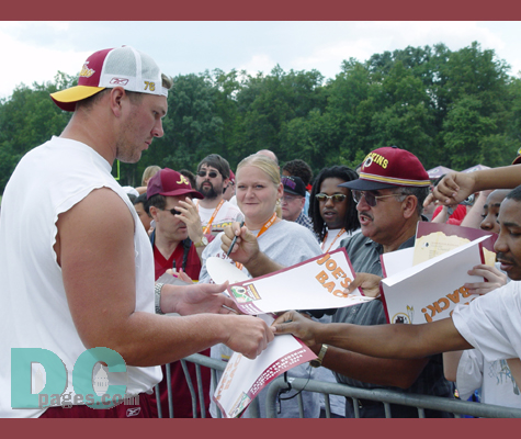 Tackle Jon Jansen also came out before practice to sign and chat with the masses