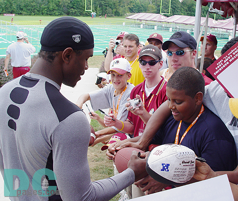 McCants was enticed by the fans to come over and sign.