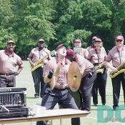 Symbolman Steve Richards is in his third season with the band.  Richards, from Centerville, Virginia, said "It's a great thrill and I certainly try to put a litle enthusiaism in my playing."  The showstoper got the fans pumped up for Coach Gibbs.