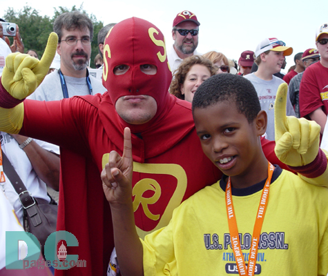 "Superskin" appears out of nowhere to encite the crowd.  "We need to get Fed Ex where it used to be, which is RFK Statium, we have 92,000 people to do it with now.  It is also the reasurrection of the 12th man'" he said.  "Superskin" admits his weakness is the Dallas Cowboys.  "Are we gonna beat them Cowboys this year?" he yelled.  "It's gonns be a peice of cake this year," he screamed to the roar of the crowd.    